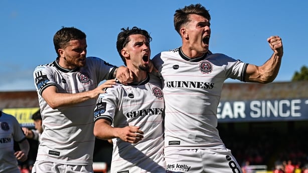 9 August 2025; Connor Parsons of Bohemians, centre, celebrates with team-mates Adam McDonnell, left, and Dayle Rooney after scoring their side's first goal during the SSE Airtricity Men's Premier Division match between Shelbourne and Bohemians at Tolka Park in Dublin. Photo by Tyler Miller/Sportsfil
