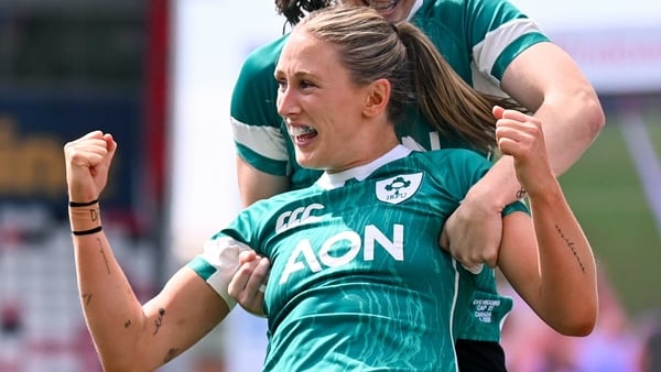 9 August 2025; Anna McGann of Ireland celebrates with Eve Higgins, rear, after scoring their side's second try during the Women's Rugby World Cup warm-up match between Ireland and Canada at Affidea Stadium in Belfast. Photo by Ramsey Cardy/Sportsfile