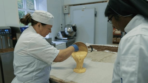 Veronica and Sister Jiby making honeycomb