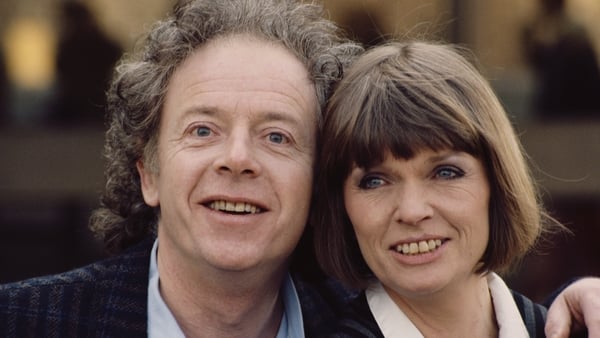British actors Ray Brooks and Janet Key pictured smiling as they pose for a photo