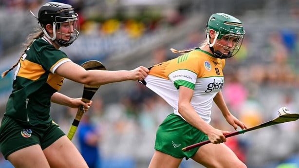 10 August 2025; Grace Teehan of Offaly is fouled by Roisin Quinn of Kerry during the Glen Dimplex All-Ireland Intermediate Camogie Championship final match between Offaly and Kerry at Croke Park in Dublin. Photo by Ramsey Cardy/Sportsfile