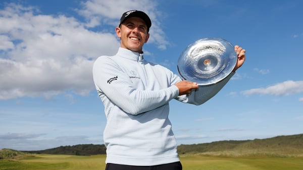BALMEDIE, SCOTLAND - AUGUST 10: Grant Forrest of Scotland poses for a photograph with Nexo Championship 2025 trophy following the final round on day four of the Nexo Championship 2025 at Trump International Golf Links on August 10, 2025 in Balmedie, Scotl