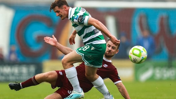 10 August 2025; John McGovern of Shamrock Rovers in action against Aaron Bolger of Galway United during the SSE Airtricity Men's Premier Division match between Galway United and Shamrock Rovers at Eamonn Deacy Park in Galway. Photo by Thomas Flinkow/Sportsfile