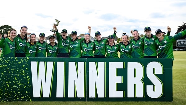 Dublin , Ireland - 10 August 2025; Ireland players celebrate with the trophy after their side's victory in match three of the Women's T20 International Series between Ireland and Pakistan at Castle Avenue Cricket Ground in Dublin. (Photo By Seb Daly/Sport