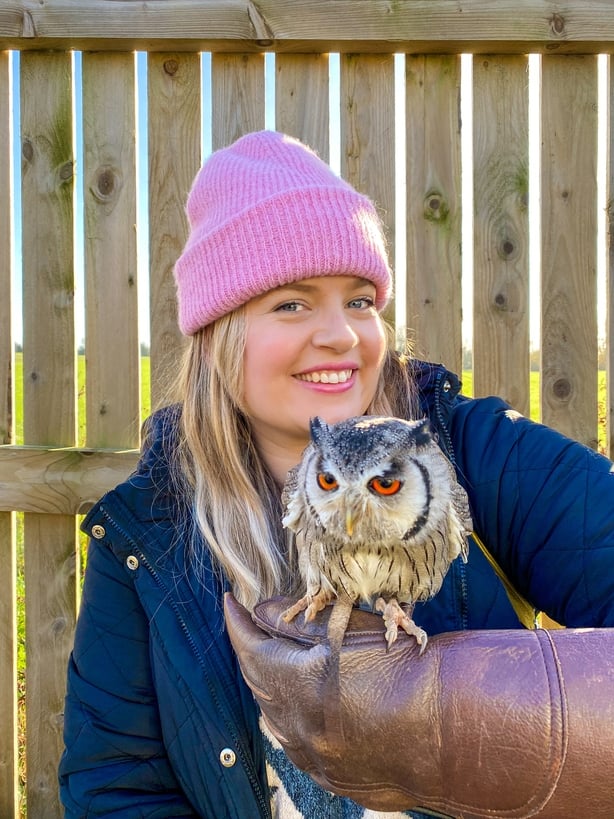 Tara Povey holding a falcon