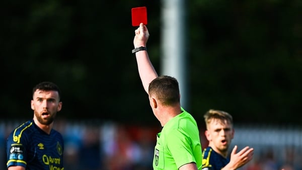 10 August 2025; Referee Damien MacGraith shows a red card to Patrick McClean of Sligo Rovers, left, during the SSE Airtricity Men's Premier Division match between St Patrick's Athletic and Sligo Rovers at Richmond Park in Dublin. Photo by Tyler Miller/Spo