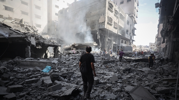 GAZA CITY, GAZA - AUGUST 08: Smoke rises amid debris after Israel targeted the area near Abbas Junction in western Gaza City, Gaza on August 08, 2025. The Israeli army targeted a warned Ajur family home, causing casualties and fatalities. Many nearby buildings were damaged, with smoke billowing from