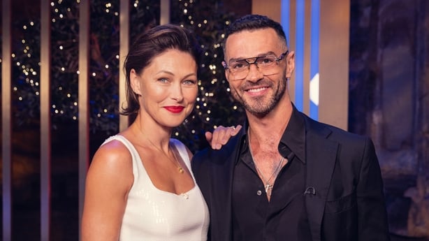 Love is Blind UK hosts Emma Willis and Matt Willis smile for a photo