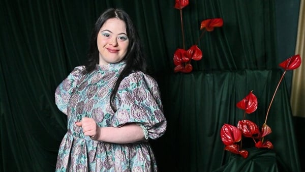 Ellie Goldstein smiles at a party to celebrate British Vogue Forces for Change 2024
