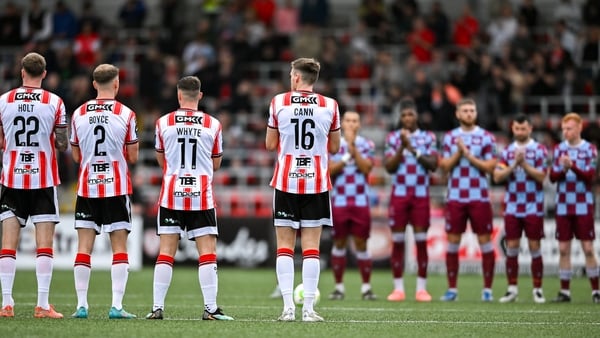 Players from both teams observe a minute's silence in honour of the late Mary Higgins, mother of former Derry City manager Ruaidhri Higgins, before the SSE Airtricity Men's Premier Division match between Derry City and Drogheda United at The Ryan McBride