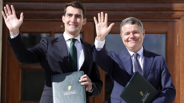 Picture of Jack Chambers and Paschal Donohoe as they present budget 2025 at Government Buildings
