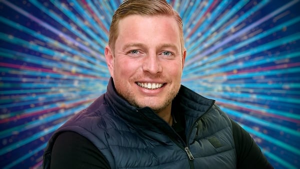 Tom Skinner is seen smiling in a BBC promotional photo for Strictly Come Dancing