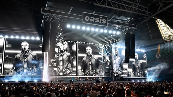 CARDIFF, WALES - JULY 04: (EDITORS NOTE: EDITORIAL USE ONLY. IMAGES MAY ONLY BE USED IN RELATION TO THE EVENT. NO COMMERCIAL USE. NO USE IN PUBLICATIONS SOLELY DEDICATED TO THE ARTIST. NO USE AFTER JULY 03, 2026.) Oasis perform on stage during the opening