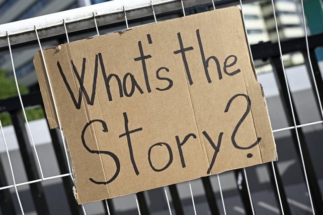 LONDON, ENGLAND - JULY 25: A general view of fan made signs attached to the fence outside the Oasis Live '25 Tour at Wembley Stadium on July 25, 2025 in London, England. (Photo by Ben Montgomery/Getty Images)