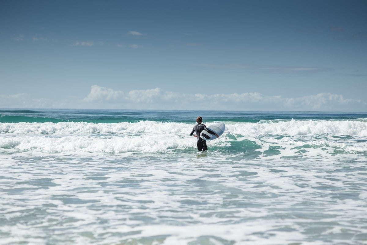 Surf Lessons for Cleaning the Beach