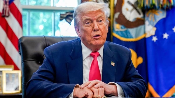 Donald Trump speaks to reporters at the White House