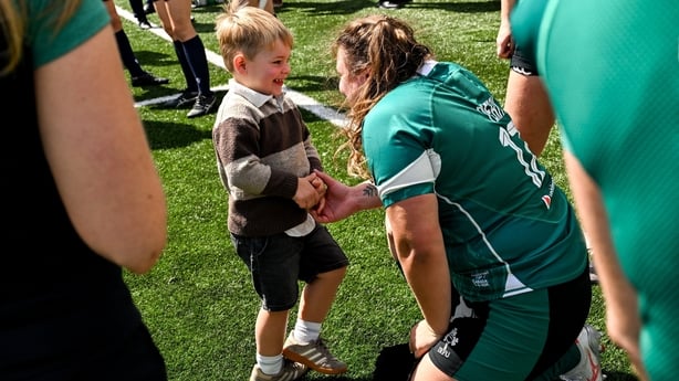 9 August 2025; Ellena Perry of Ireland and her son Bert after the Women's Rugby World Cup warm-up match between Ireland and Canada at Affidea Stadium in Belfast. Photo by Ramsey Cardy/Sportsfile