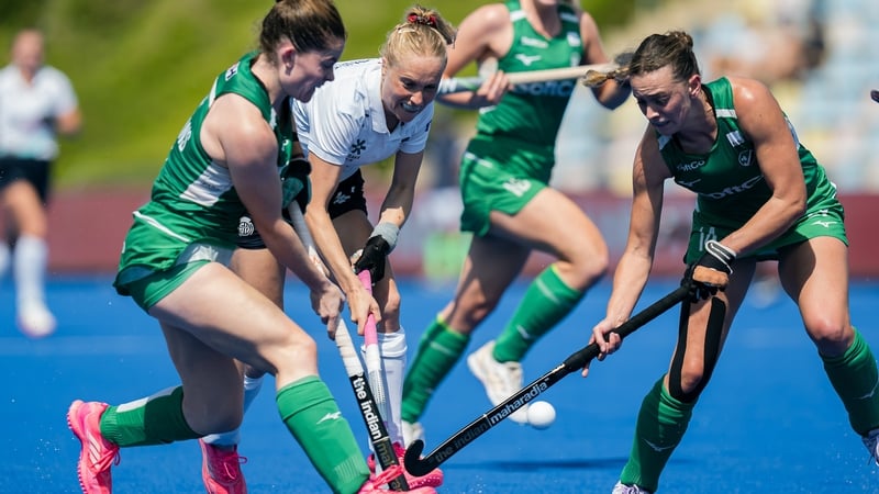 Fiona Burnet of Scotland battles for the ball with Ireland's Ellen Curran (Image: World Sport Pics)