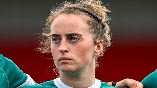 2 August 2025; Molly Scuffil-McCabe of Ireland sings the national anthem ahead of the Women's Rugby World Cup warm-up match between Ireland and Scotland at Virgin Media Park in Cork. Photo by Shauna Clinton/Sportsfile