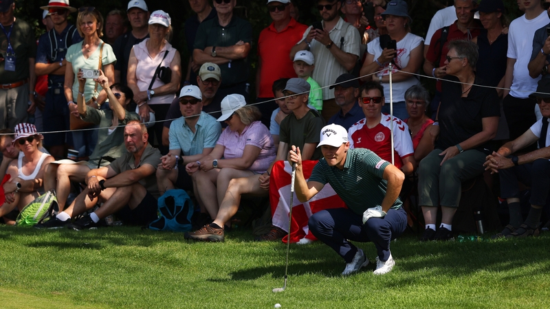 Rasmus Hojgaard of Denmark lining up a chip on the 8th hole