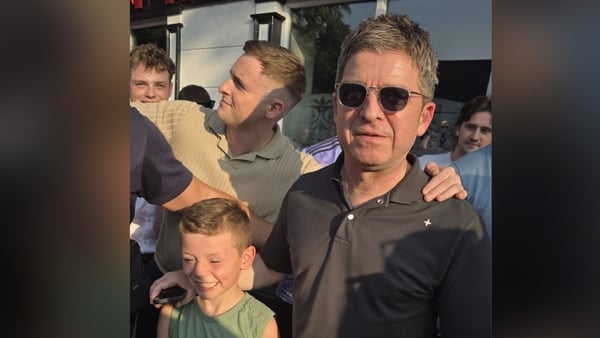 Noel Gallagher pictured in Maynooth with young Irish fan