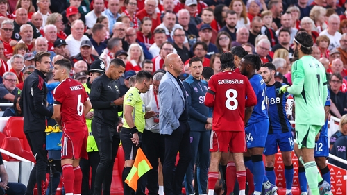 Match referee Anthony Taylor stopped play in the 29th minute and spoke with managers Arne Slot and Andoni Iraola