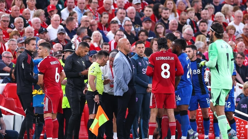 Match referee Anthony Taylor stopped play in the 29th minute and spoke with managers Arne Slot and Andoni Iraola
