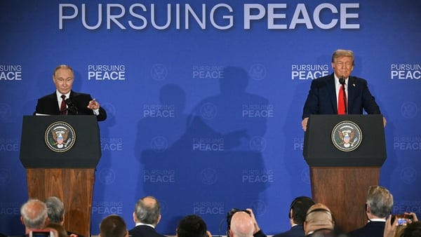 Vladimir Putin and Donald Trump at a joint press conference