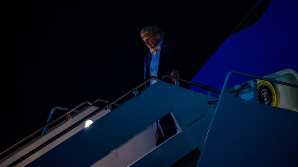 Donald Trump steps off Air Force One airplane 