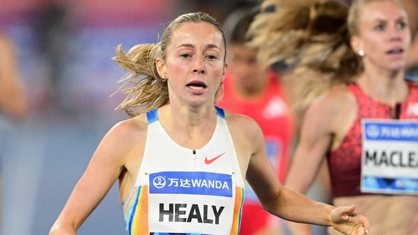 Ireland's Sarah Healy (L) crosses the finish line to win the women's 1500m event of the Diamond League athletics meeting