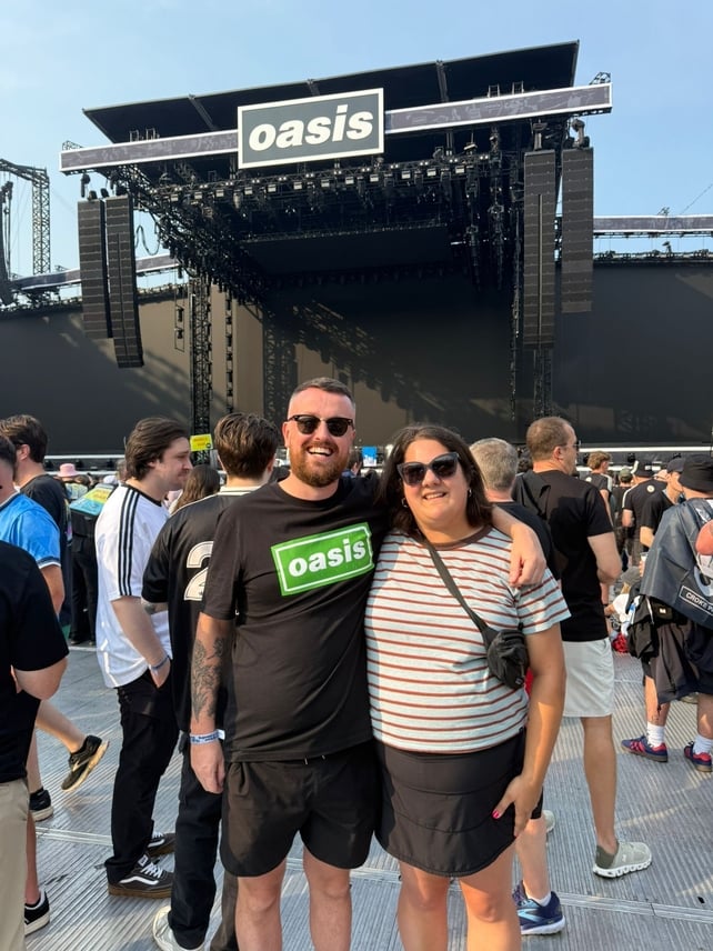 Colm and Laura Byrne in front of the Oasis stage in Croke Park