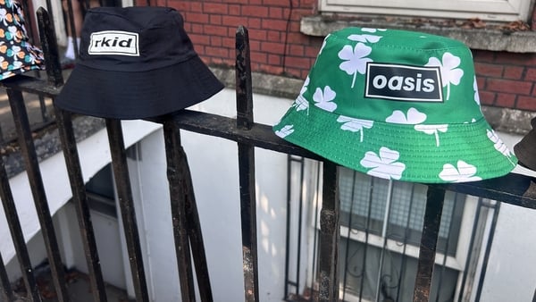 Oasis bucket hats on railings outside Croke Park