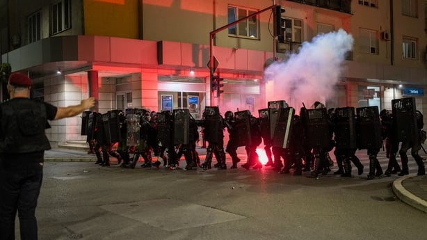 iot police officers are seen during clashes with demonstrators during an anti-government rally in Valjevo