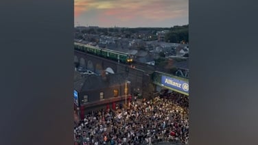 Oasis fans turn Dublin street into giant sing-along