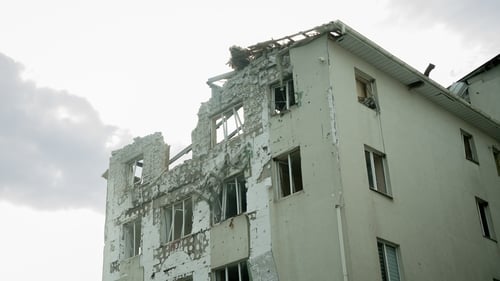 A drone attack on Kharkiv reduced part of a five-storey residential building to rubble