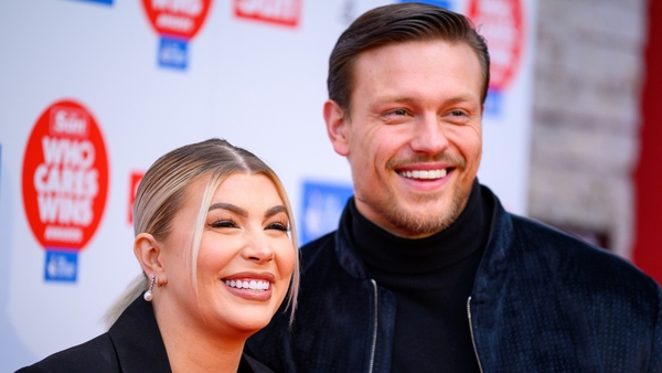 Olivia Bowen and Alex Bowen smile as they attend The Who Cares Wins Awards 2022 at The Roundhouse on 22 November, 2022 in London