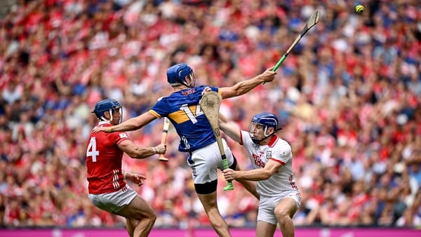 20 July 2025; John McGrath of Tipperary scores his second and his side's third goal past Cork goalkeeper Patrick Collins and Seán O'Donoghue of Cork during the GAA Hurling All-Ireland Senior Championship final match between Cork and Tipperary at Croke Par