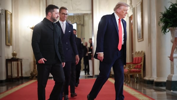 WASHINGTON, DC - AUGUST 18: U.S. President Donald Trump and Ukrainian President Volodymyr Zelensky arrive for a picture with European leaders, including Finnish President Alexander Stubb (C), following a meeting in the Oval Office at the White House on Au