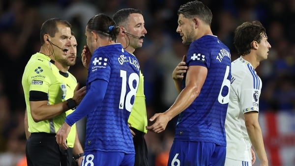 Everton's English midfielder #18 Jack Grealish and Everton's English defender #06 James Tarkowski have words with the officials after the English Premier League football match between Leeds United and Everton at Elland Road