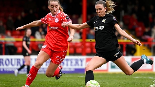 1 March 2025; Maddie Gibson of Athlone Town in action against Aoibheann Clancy of Shelbourne during the 2025 Women's President's Cup match between Shelbourne and Athlone Town at Tolka Park in Dublin. Photo by Stephen McCarthy/Sportsfile