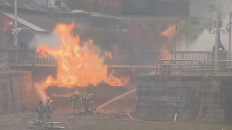 Dublin Fire Brigade said four fire engines, a foam tender and a water tanker attended the scene at George's Dock in the IFSC