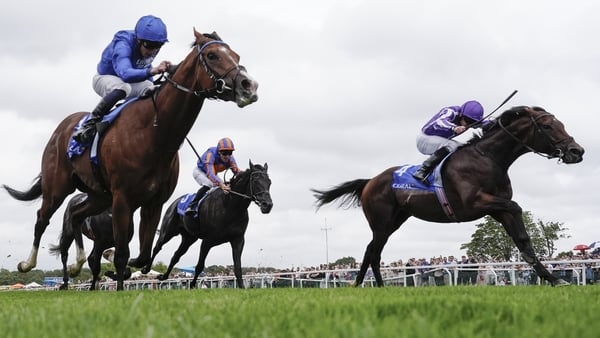 ESHER, ENGLAND - JULY 05: Ryan Moore riding Delacroix (R, purple) win The Coral Eclipse from William Buick and Ombudsman (L, blue) at Sandown Park Racecourse on July 05, 2025 in Esher, England. (Photo by Alan Crowhurst/Getty Images)