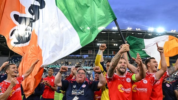 16 July 2025; Paddy Barrett of Shelbourne and teammates after their side's victory in the UEFA Champions League First Qualifying Round second leg match between Linfield and Shelbourne at Clearer Twist National Football Stadium at Windsor Park in Belfast. Photo by Stephen McCarthy/Sportsfile