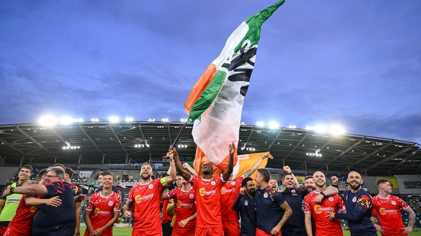 Shelbourne players celebrate after the UEFA Champions League First Qualifying Round second leg match between Linfield and Shelbourne at Clearer Twist National Football Stadium at Windsor Park in Belfast.