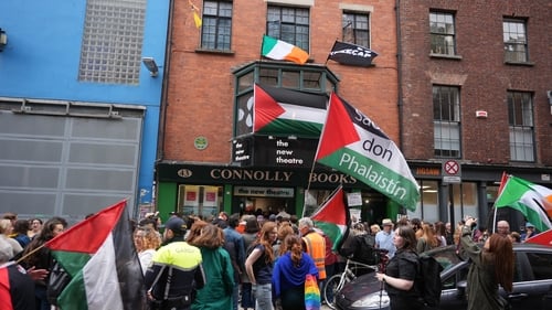 People attend a music session staged in Connolly Books in Dublin's Temple Bar to show solidarity for Kneecap's Liam Óg Ó hAnnaidh after he appeared at Westminster Magistrates' Court, in London, charged with a terrorism offence. / Photo credit: Niall Carso