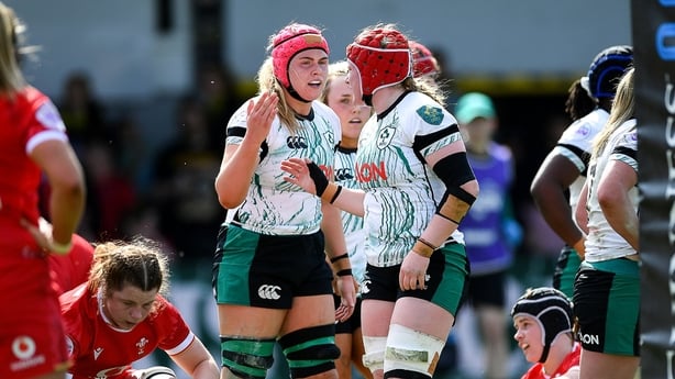 20 April 2025; Aoife Wafer of Ireland celebrates scoring a try with team-mates during the Women's Six Nations Rugby Championship match between Wales and Ireland at Rodney Parade in Newport, Wales. Photo by Kian Abdullah/Sportsfile