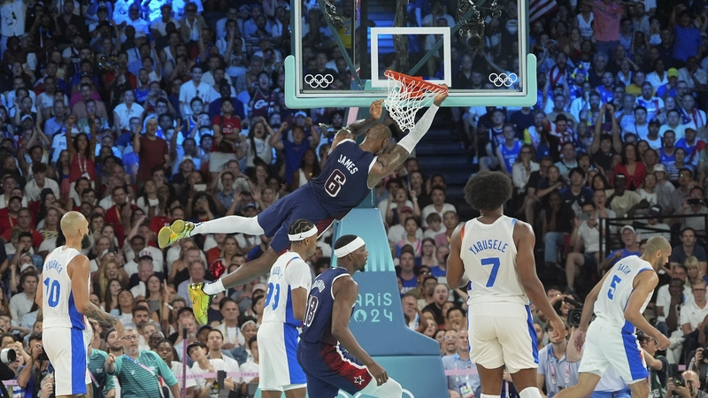 Lebron James of the USA dunks the ball during the men's basketball final against France at the 2024 Olympics