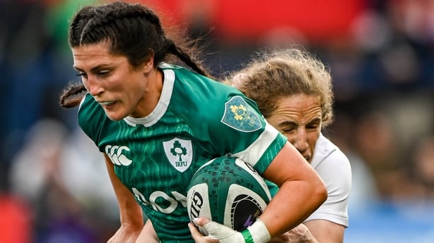 12 April 2025; Amee-Leigh Costigan of Ireland is tackled by Abby Dow of England during the Women's Six Nations Rugby Championship match between Ireland and England at Virgin Media Park in Cork. Photo by Matt Browne/Sportsfile