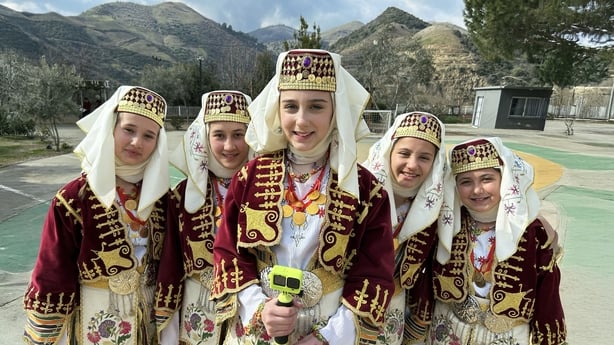 A group of girls in traditional dress.
