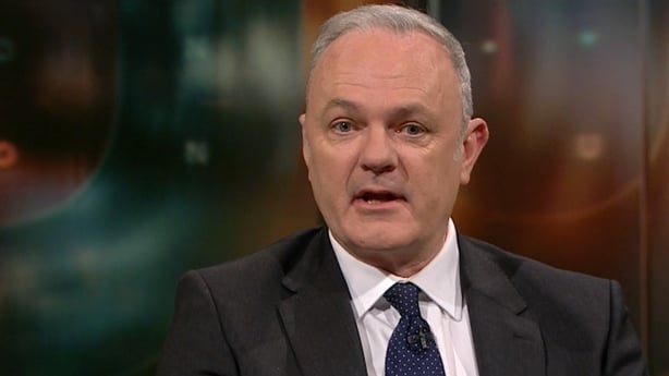 A man being interviewied on TV